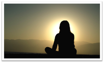 girl overlooking sunset