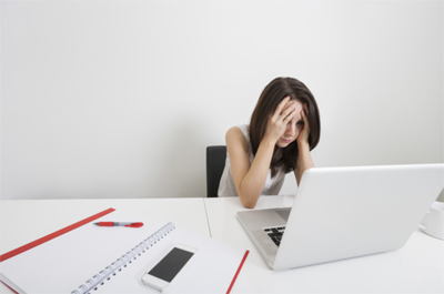 Stressed Woman at Desk