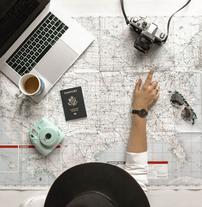 Woman Pointing to Map