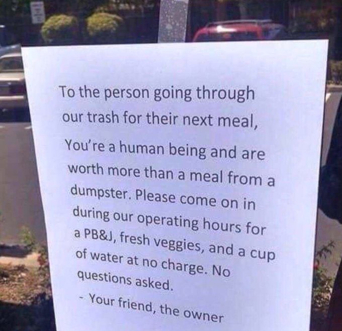 Sign on restaurant door offering free meal