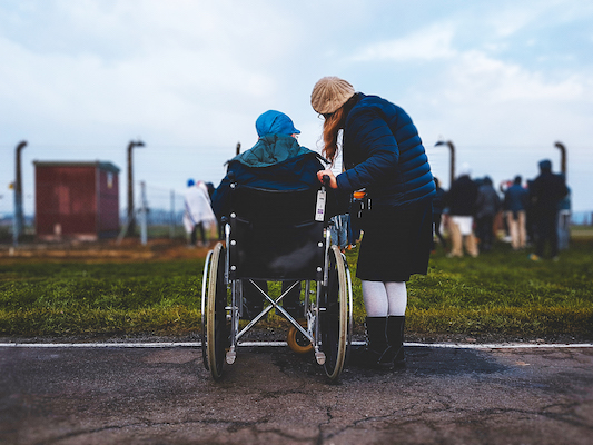 Woman with Older Person in Wheelchair