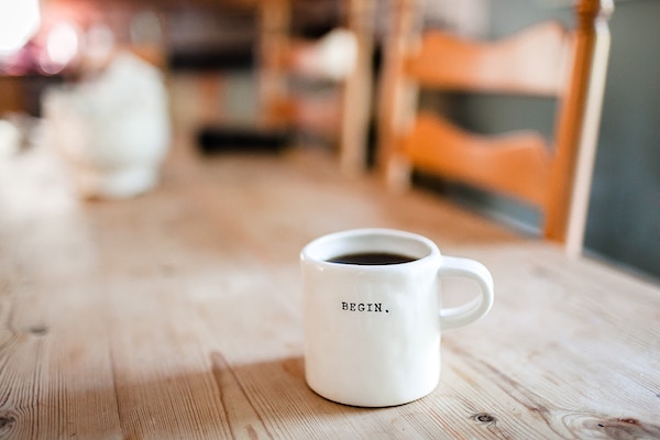 Coffee Cup That Says Begin