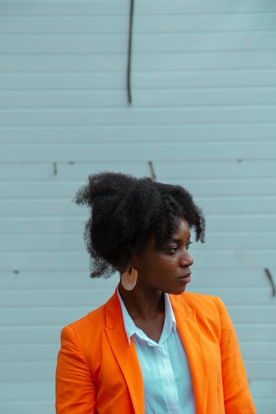 Pondering Woman in Suit