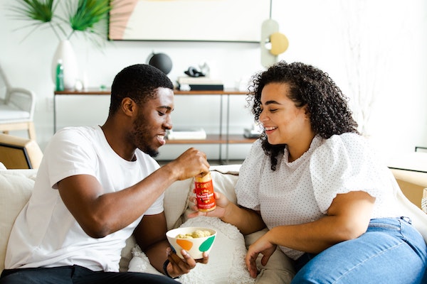 A Couple Sharing Food