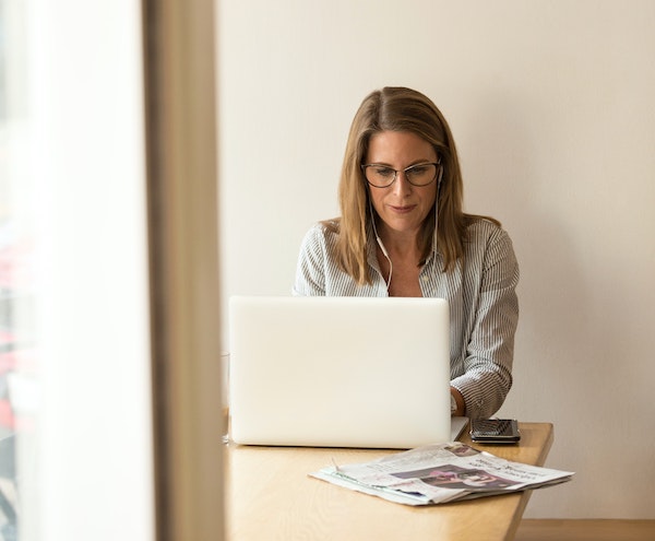 Woman Working on Laptop Computer