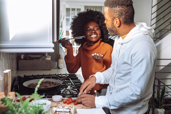 Couple Cooking a Meal Together