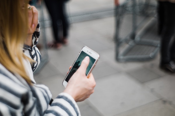 Woman Holding Phone