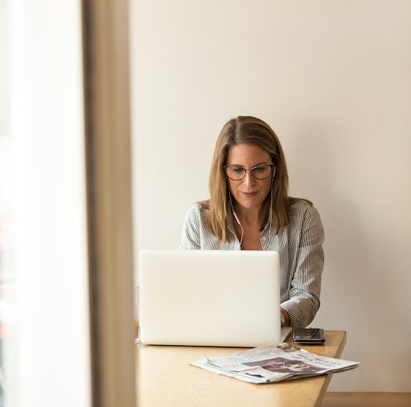 Woman Working on Laptop Computer